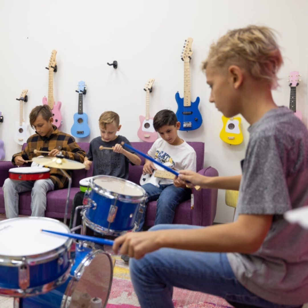 boy playing drums