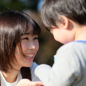 mom talking to young son